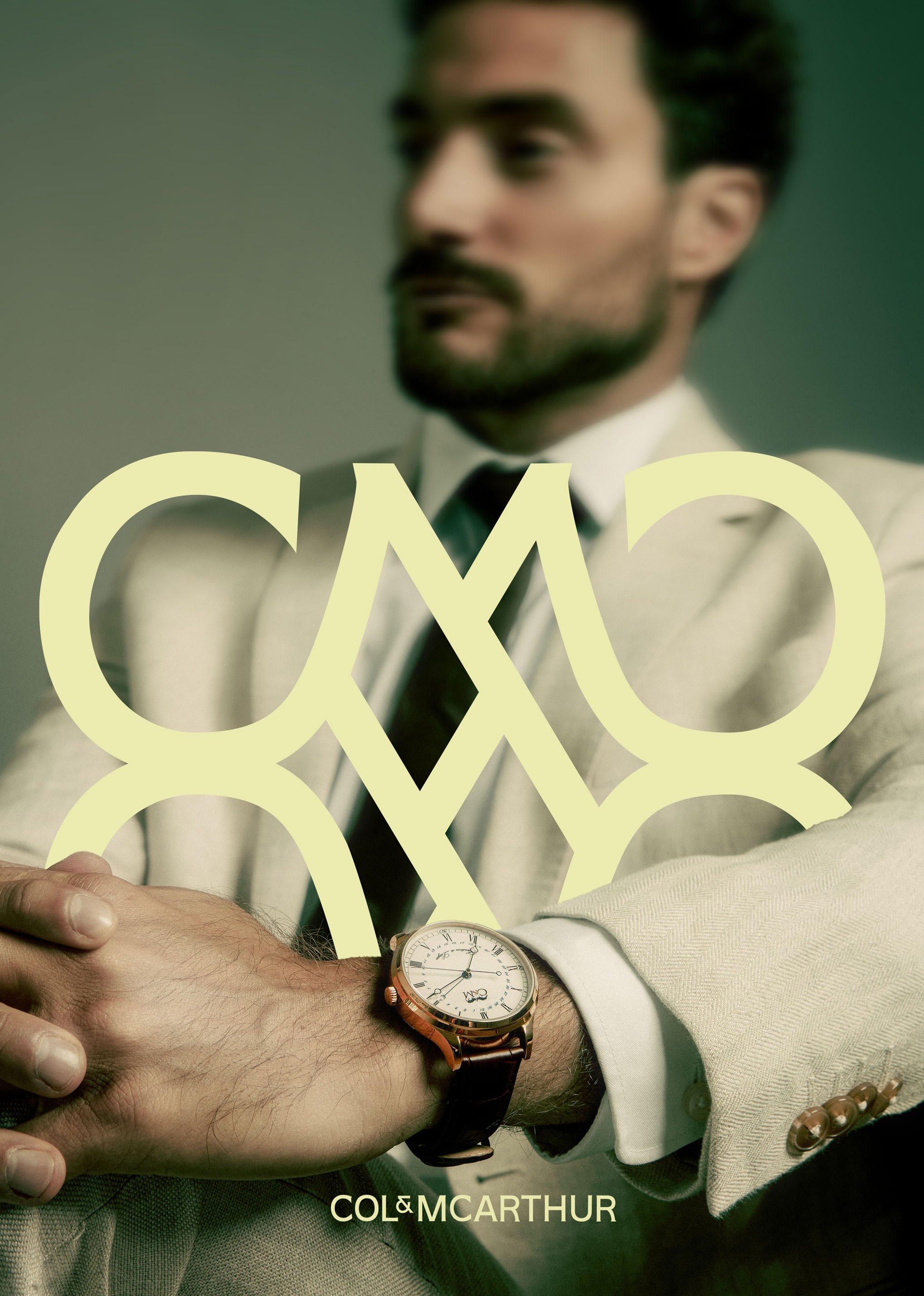 blurry photo of sunset over ocean with logo on top